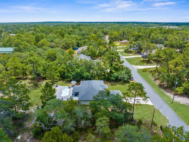 10197 Meadow Wren Ave, Weeki Wachee, FL 34613 - drone / aerial view of a heavily wooded area