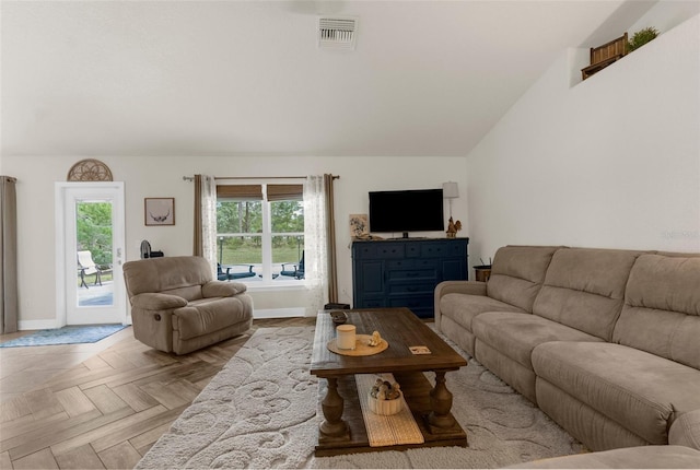 10197 Meadow Wren Ave, Weeki Wachee, FL 34613 - living room with baseboards and lofted ceiling