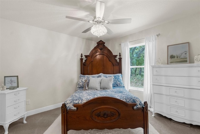 10197 Meadow Wren Ave, Weeki Wachee, FL 34613 - bedroom featuring carpet floors, baseboards, and ceiling fan