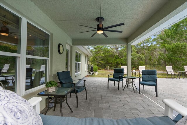 10197 Meadow Wren Ave, Weeki Wachee, FL 34613 - view of patio / terrace featuring ceiling fan