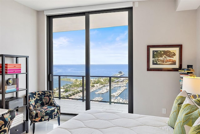 100 1st Ave N Unit 2703, Saint Petersburg, FL 33701 - bedroom with a wall of windows, a water view, view of marina, and multiple windows