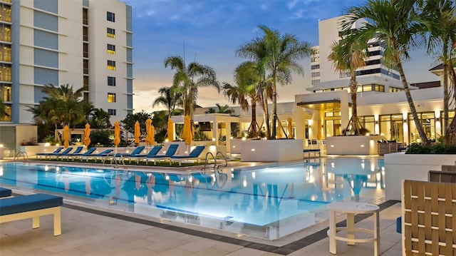 100 1st Ave N Unit 2703, Saint Petersburg, FL 33701 - pool at dusk featuring a community pool
