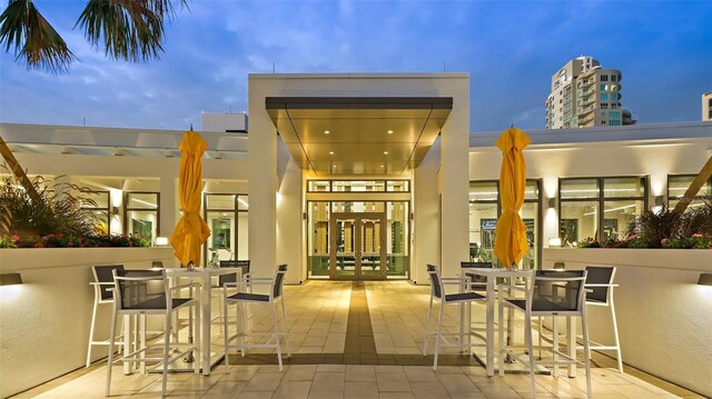 100 1st Ave N Unit 2703, Saint Petersburg, FL 33701 - view of patio featuring french doors and outdoor dining space