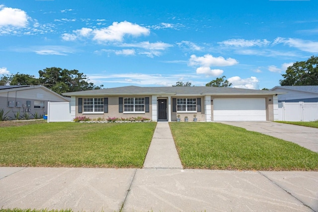 1706 Sloop Pl, Brandon, FL 33511 - ranch-style home with an attached garage, driveway, and stucco siding