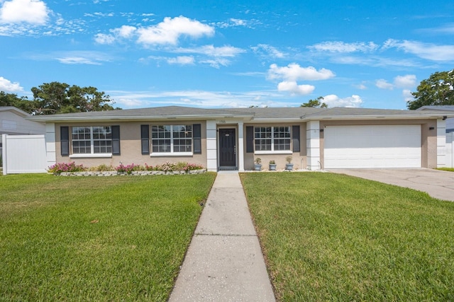 1706 Sloop Pl, Brandon, FL 33511 - single story home featuring stucco siding, a garage, and driveway