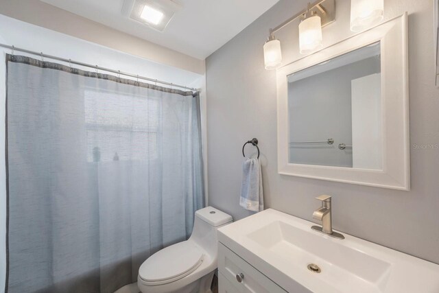 1706 Sloop Pl, Brandon, FL 33511 - bathroom featuring vanity, toilet, and shower / tub combo