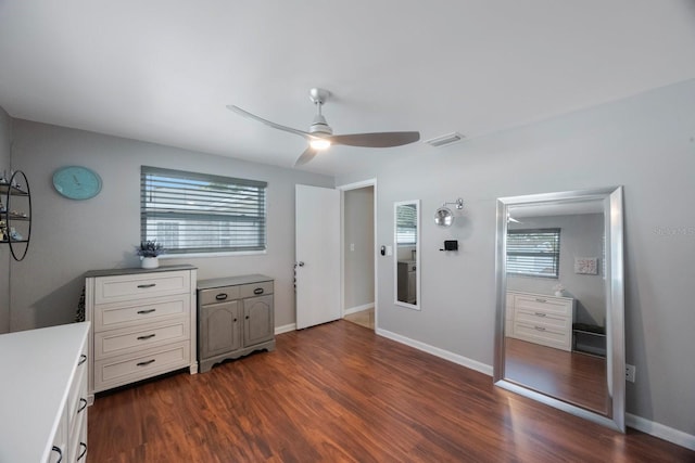 1706 Sloop Pl, Brandon, FL 33511 - bedroom with dark wood-type flooring, baseboards, and a ceiling fan