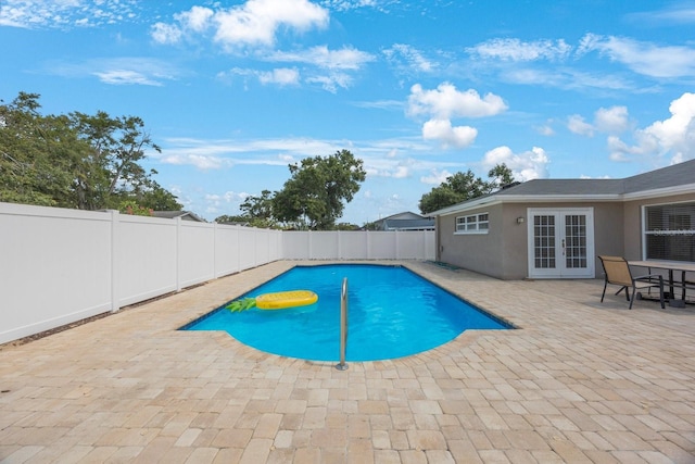 1706 Sloop Pl, Brandon, FL 33511 - view of pool with french doors, a fenced backyard, and a patio area