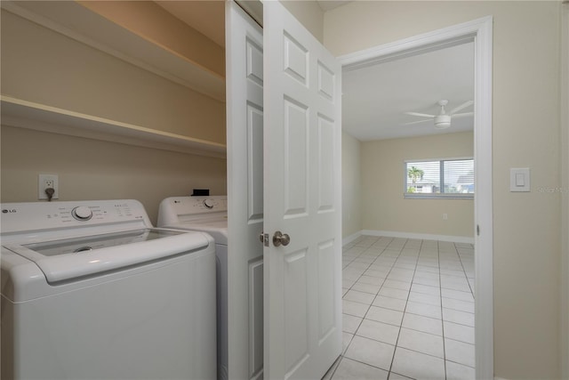 2010 Bayview Pl, Indian Rocks Beach, FL 33785 - laundry area featuring independent washer and dryer, light tile patterned floors, ceiling fan, and baseboards