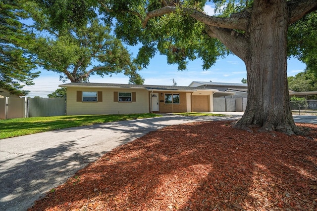6282 41st Ave N, Saint Petersburg, FL 33709 - single story home featuring an attached garage and driveway