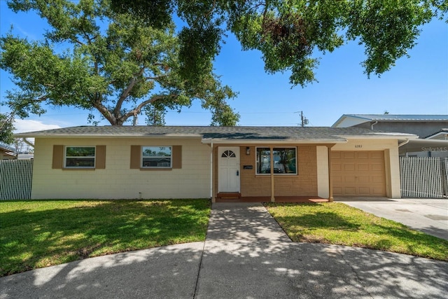 6282 41st Ave N, Saint Petersburg, FL 33709 - ranch-style house with an attached garage, concrete driveway, roof with shingles, and concrete block siding