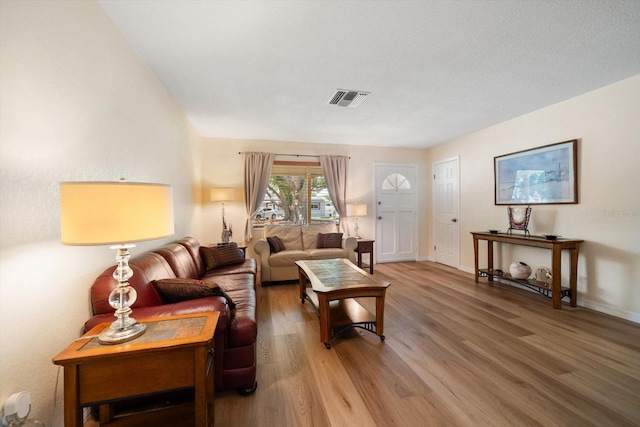 6282 41st Ave N, Saint Petersburg, FL 33709 - living area featuring light wood-type flooring and baseboards