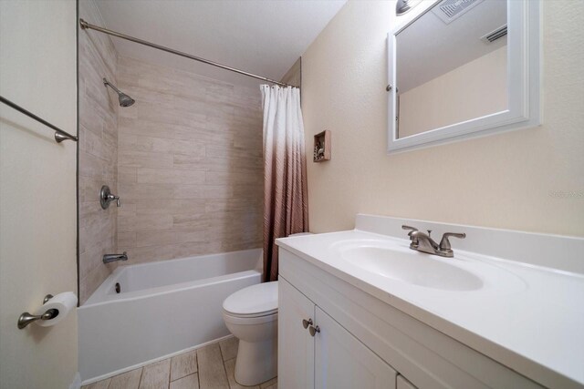 6282 41st Ave N, Saint Petersburg, FL 33709 - full bathroom with vanity, shower / bath combo, and toilet