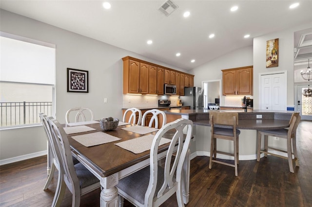 2350 126th Dr E, Parrish, FL 34219 - dining room with dark wood-type flooring, recessed lighting, lofted ceiling, and a chandelier