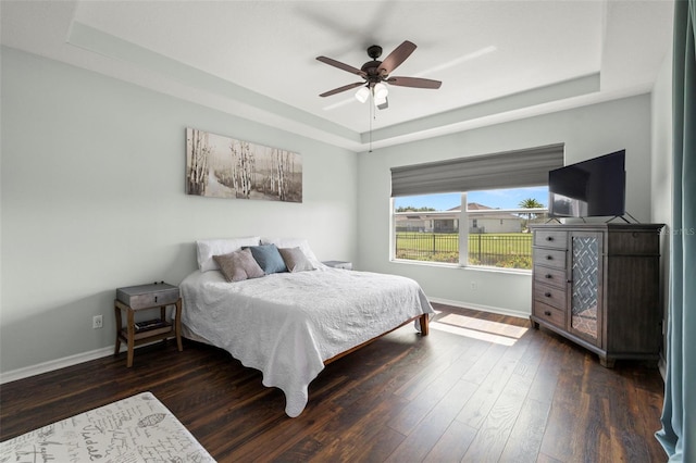 2350 126th Dr E, Parrish, FL 34219 - bedroom featuring a raised ceiling, dark wood-style flooring, and ceiling fan