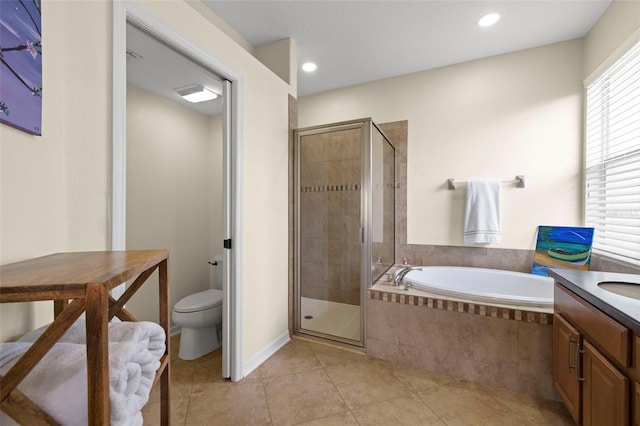 2350 126th Dr E, Parrish, FL 34219 - full bathroom featuring a bath, a shower stall, tile patterned flooring, vanity, and recessed lighting