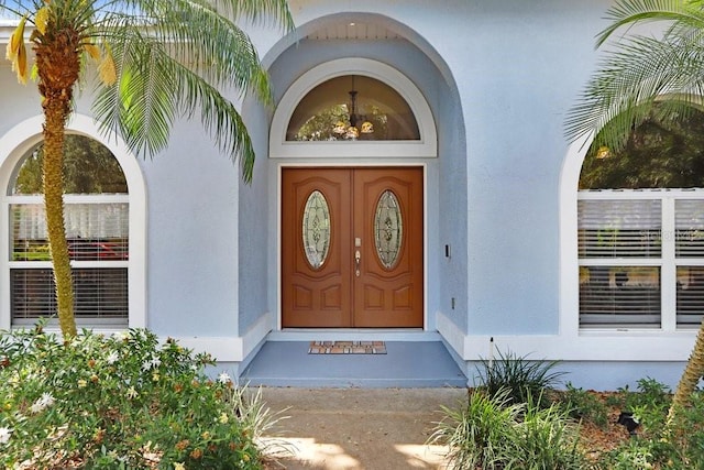 613 Sportsman Park Dr, Seffner, FL 33584 - view of exterior entry with stucco siding