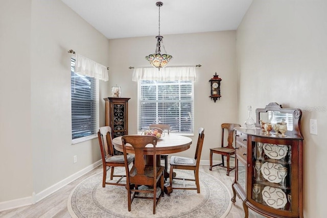 613 Sportsman Park Dr, Seffner, FL 33584 - dining area with baseboards and light wood-type flooring