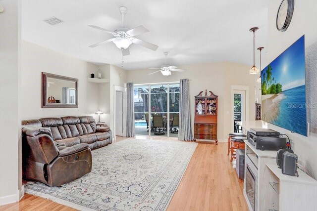 613 Sportsman Park Dr, Seffner, FL 33584 - living area with light wood-style floors, plenty of natural light, ceiling fan, and baseboards