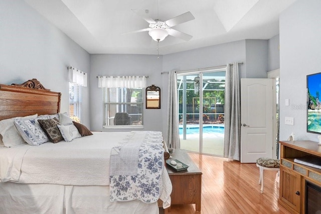613 Sportsman Park Dr, Seffner, FL 33584 - bedroom featuring access to exterior, light wood-type flooring, and ceiling fan