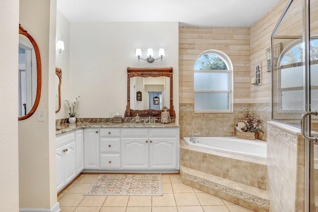 613 Sportsman Park Dr, Seffner, FL 33584 - full bath featuring vanity, tile patterned floors, a garden tub, and an enclosed shower