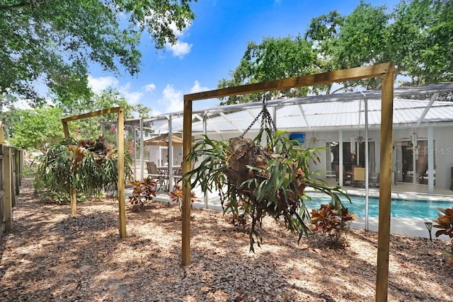 613 Sportsman Park Dr, Seffner, FL 33584 - back of property with an outdoor pool and a patio