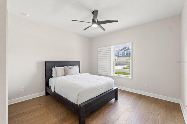 6123 Golden Nettle Dr, Apollo Beach, FL 33572 - bedroom featuring baseboards, hardwood / wood-style floors, and ceiling fan