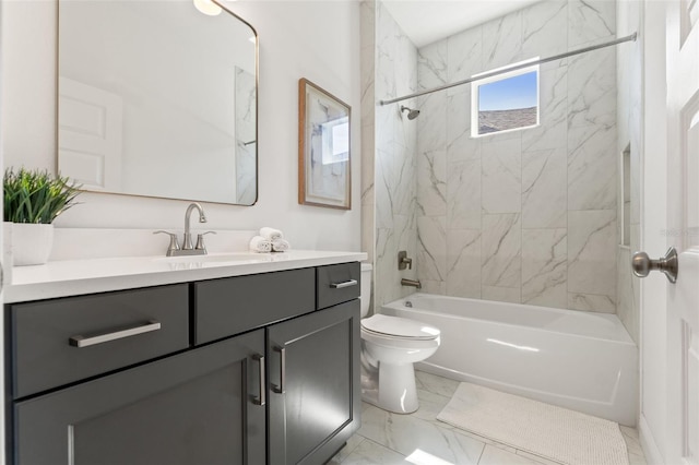 6123 Golden Nettle Dr, Apollo Beach, FL 33572 - full bathroom featuring vanity, shower / washtub combination, toilet, and marble look tiles