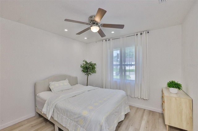 1110 Waterview Blvd E, Lakeland, FL 33801 - bedroom featuring light wood-type flooring, baseboards, recessed lighting, and ceiling fan
