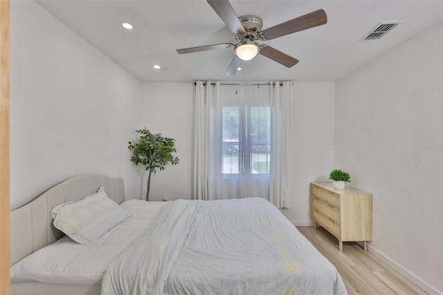 1110 Waterview Blvd E, Lakeland, FL 33801 - bedroom featuring light wood-style floors, baseboards, recessed lighting, and a ceiling fan