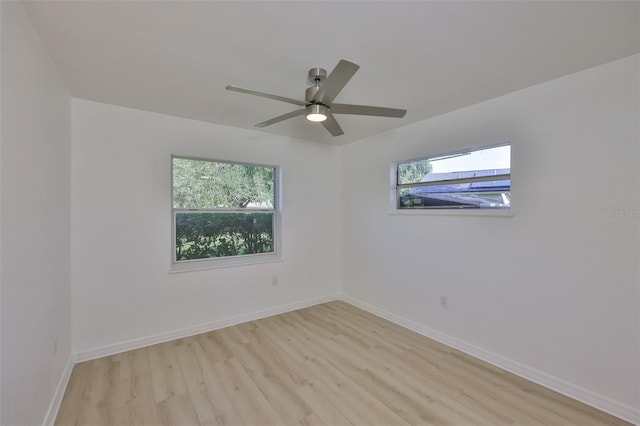 1110 Waterview Blvd E, Lakeland, FL 33801 - spare room featuring light wood-style floors, ceiling fan, and baseboards