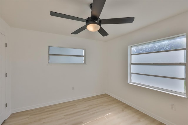 1110 Waterview Blvd E, Lakeland, FL 33801 - empty room featuring light wood finished floors, baseboards, and ceiling fan
