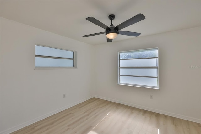 1110 Waterview Blvd E, Lakeland, FL 33801 - empty room featuring light wood-style floors, baseboards, and ceiling fan