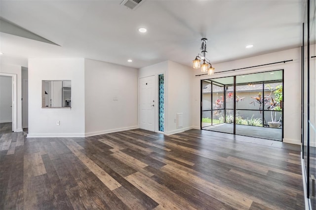 660 Channing Dr, Palm Harbor, FL 34684 - unfurnished room with dark wood-style floors, baseboards, and recessed lighting