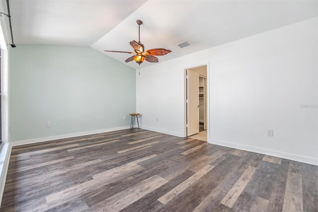 660 Channing Dr, Palm Harbor, FL 34684 - unfurnished room with ceiling fan, wood finished floors, vaulted ceiling, and baseboards