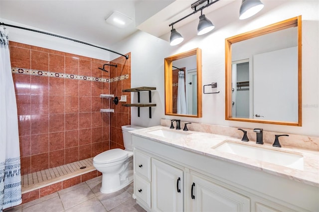 660 Channing Dr, Palm Harbor, FL 34684 - full bath with a tile shower, double vanity, toilet, and tile patterned flooring