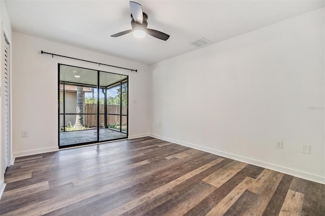 660 Channing Dr, Palm Harbor, FL 34684 - unfurnished room with ceiling fan, wood finished floors, and baseboards