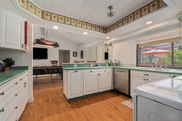 7700 Willow Brook Ct, Hudson, FL 34667 - kitchen featuring dishwasher, white cabinetry, vaulted ceiling, light wood-style floors, and recessed lighting