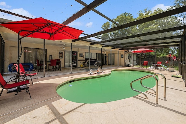 7700 Willow Brook Ct, Hudson, FL 34667 - view of pool with a patio, ceiling fan, and glass enclosure