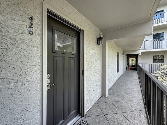 105 4th Ave NE Unit 426, Saint Petersburg, FL 33701 - entrance to property featuring stucco siding and a balcony