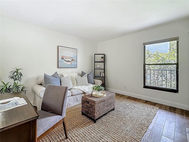105 4th Ave NE Unit 426, Saint Petersburg, FL 33701 - living room featuring hardwood / wood-style floors and baseboards