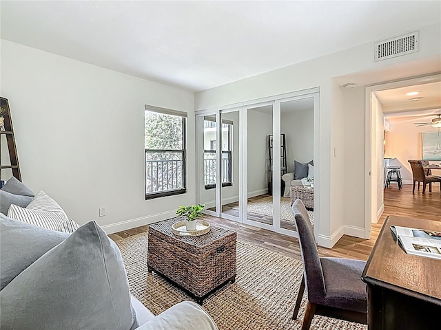 105 4th Ave NE Unit 426, Saint Petersburg, FL 33701 - living room featuring light wood-type flooring, french doors, and ceiling fan