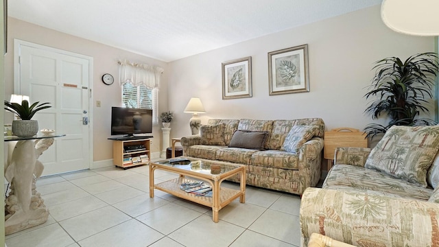 600 71st Ave Unit 16, St Pete Beach, FL 33706 - living area featuring light tile patterned floors