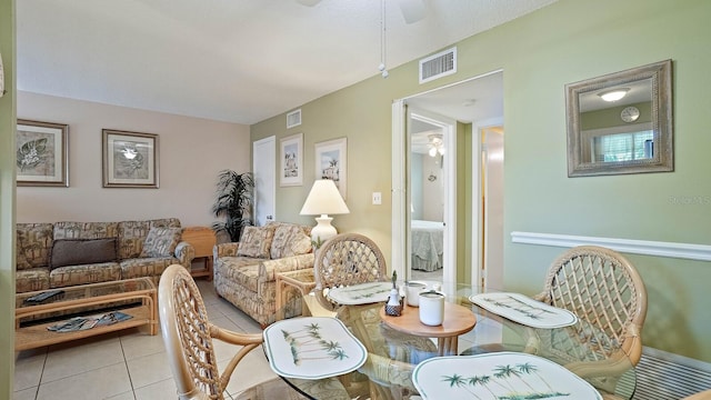 600 71st Ave Unit 16, St Pete Beach, FL 33706 - living area featuring ceiling fan and light tile patterned floors