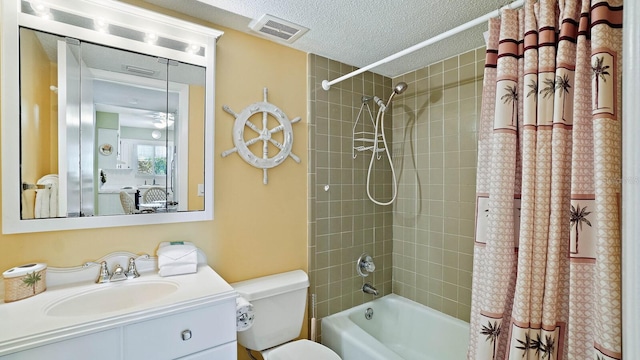 600 71st Ave Unit 16, St Pete Beach, FL 33706 - bathroom featuring shower / bath combination with curtain, vanity, toilet, and a textured ceiling