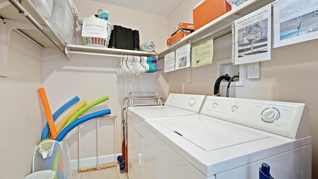 600 71st Ave Unit 16, St Pete Beach, FL 33706 - washroom with washer and clothes dryer