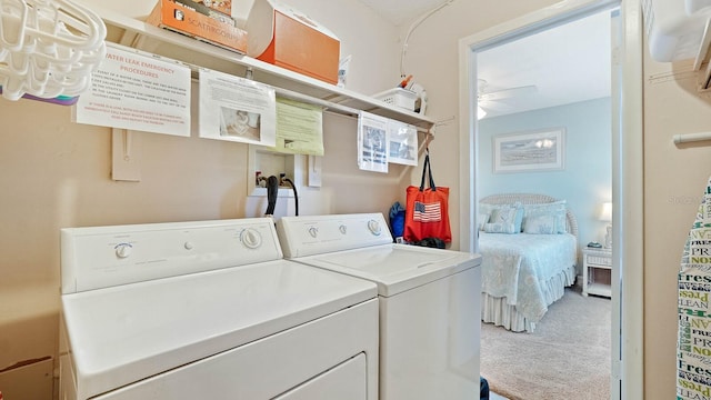 600 71st Ave Unit 16, St Pete Beach, FL 33706 - washroom with washer and clothes dryer, carpet floors, and a ceiling fan
