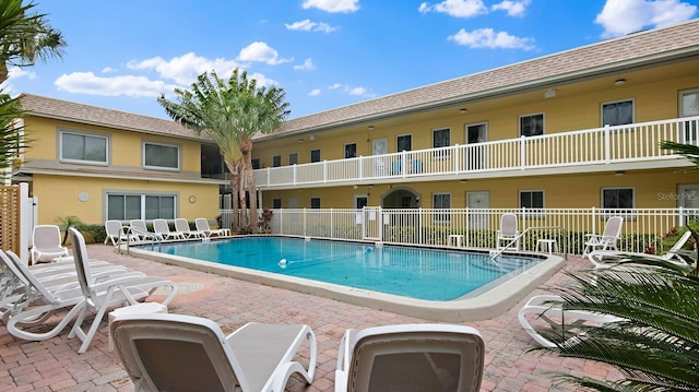600 71st Ave Unit 16, St Pete Beach, FL 33706 - community pool featuring a patio area