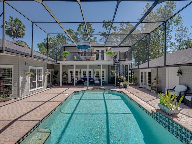 4611 Ackerly Way, Brandon, FL 33511 - swimming pool featuring french doors, a patio, stairs, ceiling fan, and glass enclosure