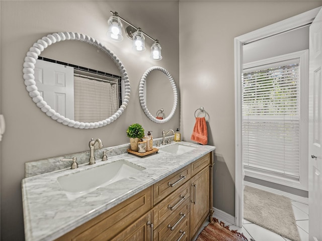 4611 Ackerly Way, Brandon, FL 33511 - bathroom featuring double vanity and baseboards
